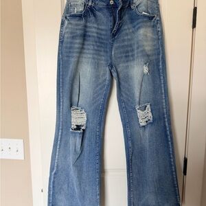 Distressed Blue Jeans
